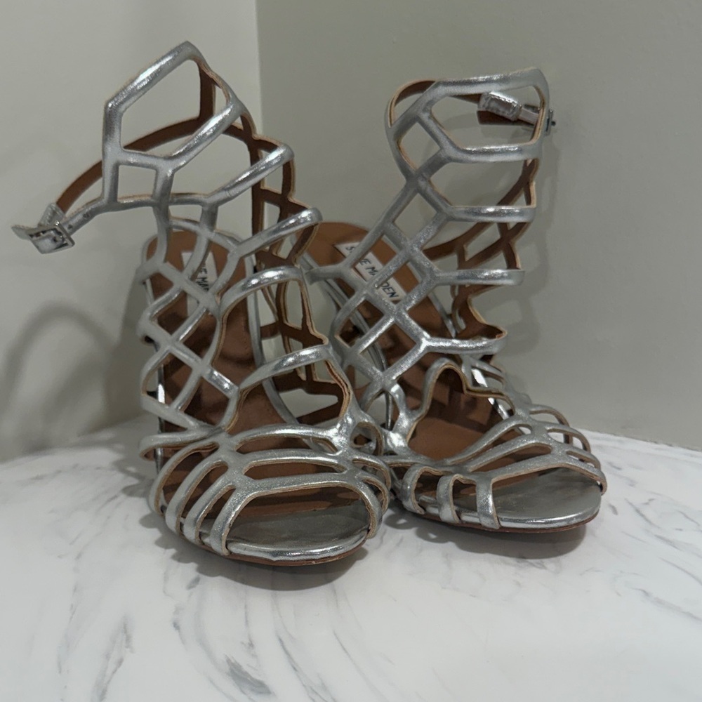 Steve Madden Slithur high-heeled caged sandals in a silver metallic finish